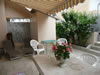 Patio with electric sun canopy, table and chairs
